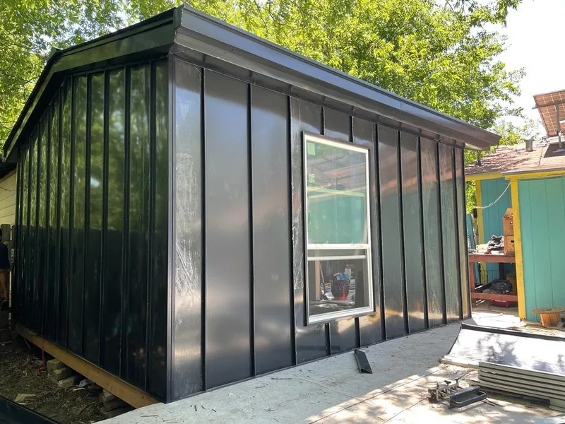 Black standing seam metal wall panels for Metal Roof Installation in New Ipswich